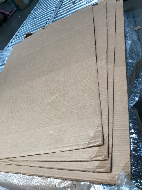 Photo 1 of (PUNCTURED) 3' x 4' cardboard sheet, 4 sheets