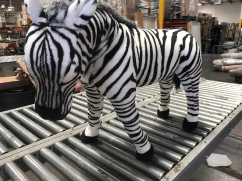 Photo 1 of toy stuffed zebra, 32"H x 39"W