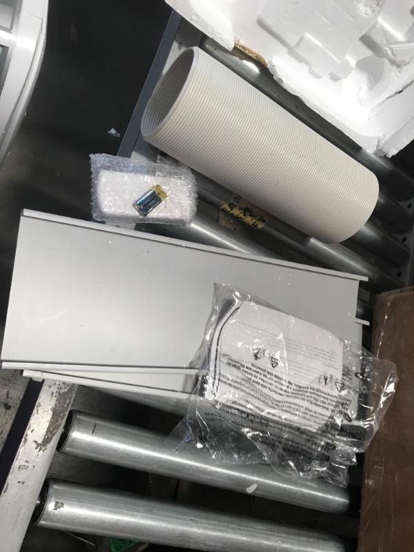 Photo 1 of BLACK+DECKER 8,000 BTU DOE (14,000 BTU ASHRAE) Portable Air Conditioner with Remote Control, White