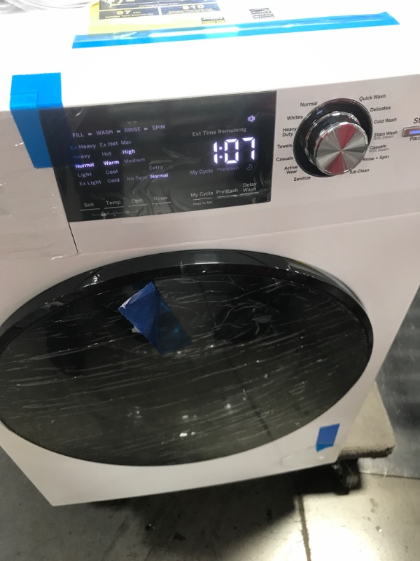 Photo 1 of 2.4 cu. ft. High-Efficiency Stackable White Front Loading Washing Machine with Steam, ENERGY STAR
