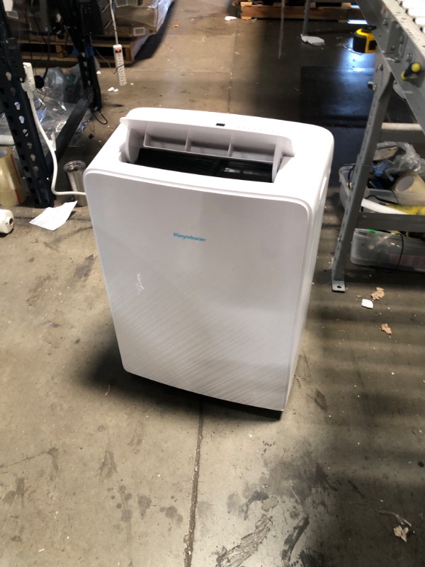 Photo 8 of (BROKEN WHEEL BASE; DAMAGED ATTACHMENTS) Keystone 13,000 Portable Air Conditioner | 7,600 BTU Supplemental Heating | Follow Me Remote Control | Timer | Sleep Mode | Dehumidifier | AC for Rooms up to 450 Sq. Ft | KSTAP13MAHC, White
