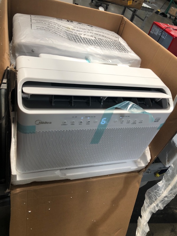 Photo 3 of TESTED POWERS ON*
Midea 10,000 BTU U-Shaped Smart Inverter Window Air Conditioner–Cools up to 450 Sq. Ft., Ultra Quiet with Open Window Flexibility, Works with Alexa/Google Assistant, 35% Energy Savings, Remote Control
