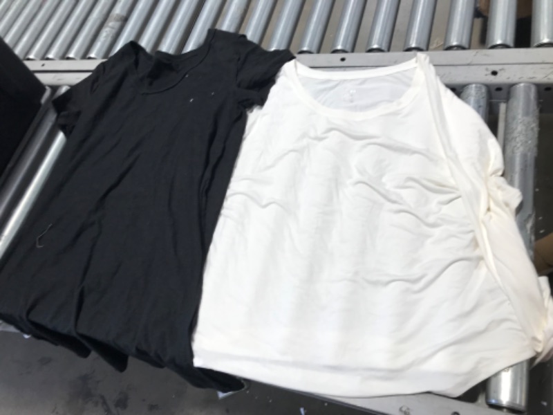 Photo 1 of *** 2 WOMENS SHIRTS *** BLACK AND WHITE SIZE XL  WHITE SHIRT STAINED