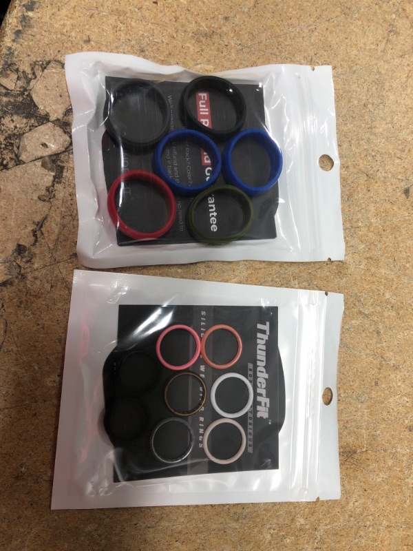 Photo 1 of THUNDERFIT RINGS
2 PACKS HIS AND HERS
MENS SIZE 13, WOMENS SIZE 3.5-4