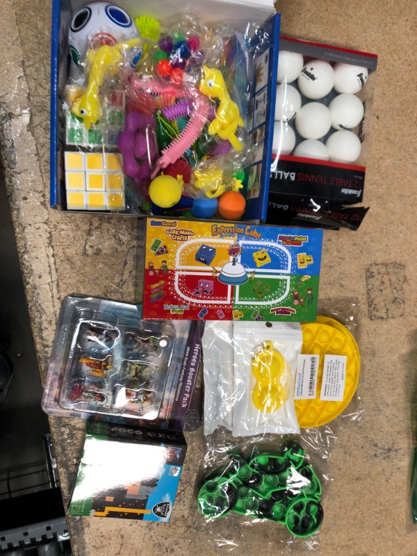 Photo 1 of BUNDLE OF TOYS, FIDGET TOYS AND TABLE TENNIS BALLS.