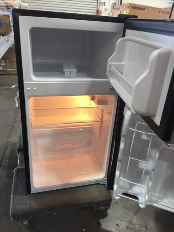 Photo 11 of **dents on top back corners of fridge**
Frigidaire EFR341, 3.2 cu ft 2 Door Fridge and Freezer, Platinum Series, Stainless Steel, Double

