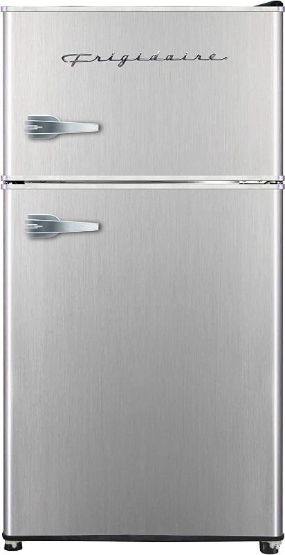 Photo 1 of **dents on top back corners of fridge**
Frigidaire EFR341, 3.2 cu ft 2 Door Fridge and Freezer, Platinum Series, Stainless Steel, Double
