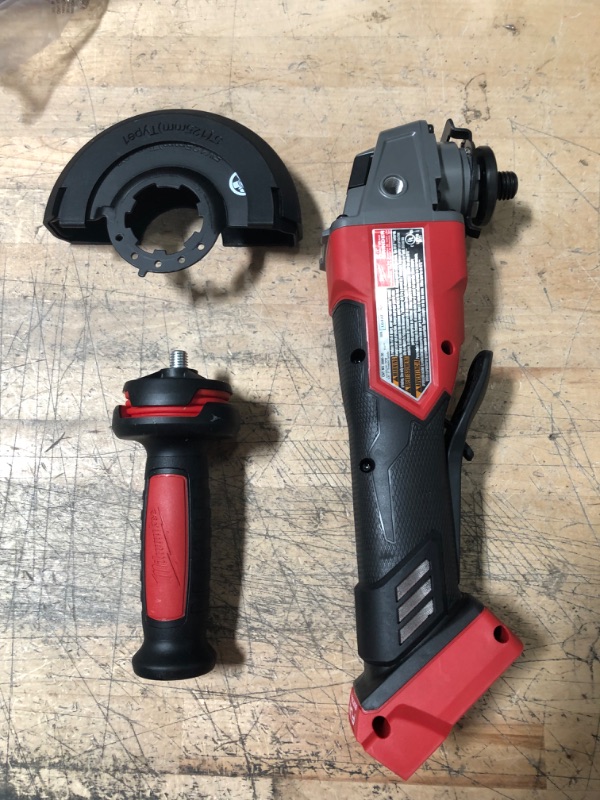 Photo 2 of 
Milwaukee
M18 FUEL 18V Lithium-Ion Brushless Cordless 4-1/2 in./5 in. Grinder w/Paddle Switch (Tool-Only)