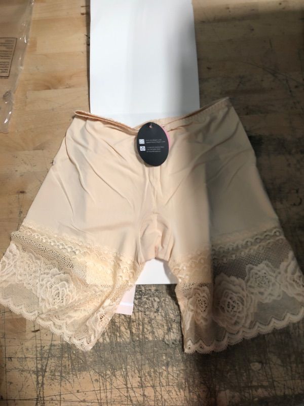 Photo 2 of Women Nude Lace Shapewear Shorts SIZE: SMALL
