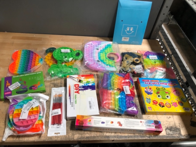 Photo 1 of Assorted Amazon Toy and Craft Bundle- Sensory, Brushes/Paint Set, and Party Supplies 