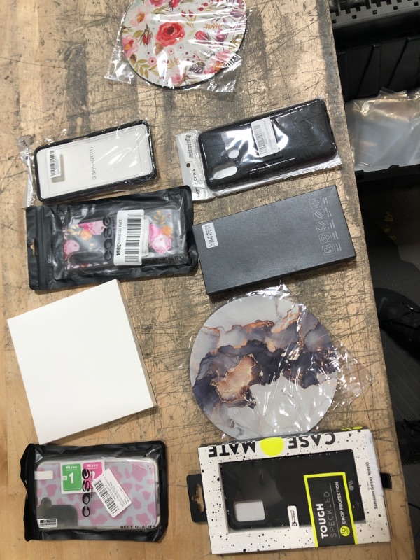 Photo 1 of Assorted Phone Case and Accessories Bundle- SAmsung Note 10, s22, Flip and a33, Moto G Stylist and OnePlus Nord n100 with Accessories 
