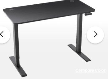 Photo 1 of Adjustable Height Desk - 60 x 30", Black 
