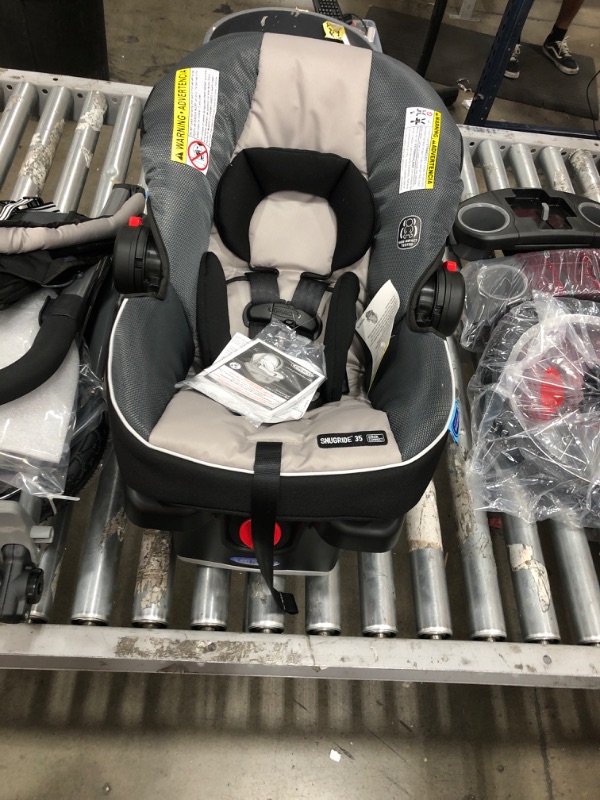 Photo 5 of Graco FastAction Fold Jogger Travel System | Includes the FastAction Fold Jogging Stroller and SnugRide 35 Infant Car Seat, Gotham