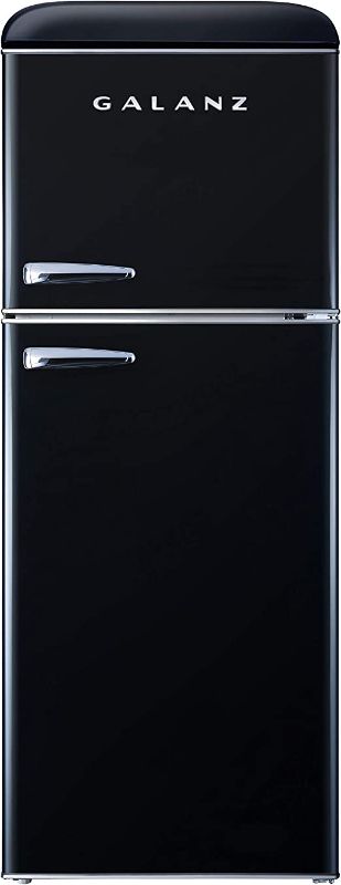 Photo 1 of PARTS ONLY DOES NOT GET COLD 
Galanz GLR46TBKER Retro Compact Refrigerator, 4.6 Cu.Ft Mini Fridge with Dual Door, Adjustable Mechanical Thermostat with True Freezer, Black

-small dent on the side 