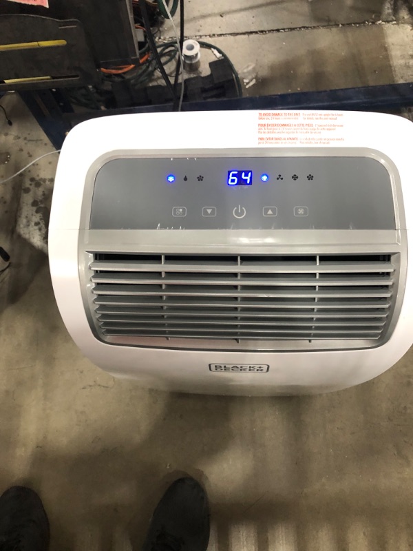 Photo 1 of PARTS ONLY COMPRESSOR DOES NOT COME ON 
BLACK+DECKER 8,000 BTU Portable Air Conditioner with Remote Control, White