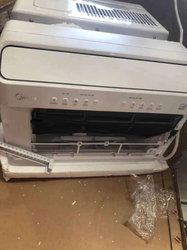 Photo 4 of **PARTS ONLY**NON FUNCTIONAL* DAMAGED* Midea 12,000 BTU U-Shaped Inverter Window Air Conditioner WiFi, 9X Quieter, Over 35% Energy Savings ENERGY STAR MOST EFFICIENT
