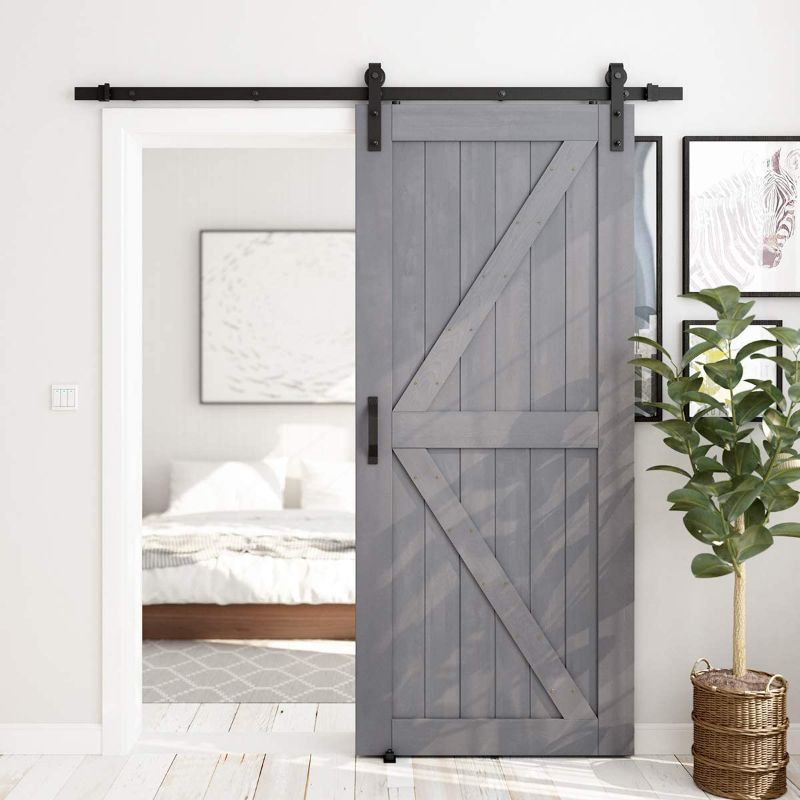 Photo 1 of *LIGHT DAMAGE** SMARTSTANDARD 36in x 84in Sliding Barn Door with 6.6ft Barn Door Hardware Kit & Handle, Pre-Drilled Ready to Assemble, DIY Unfinished Solid Spruce Wood Panelled Slab, K-Frame, Grey
