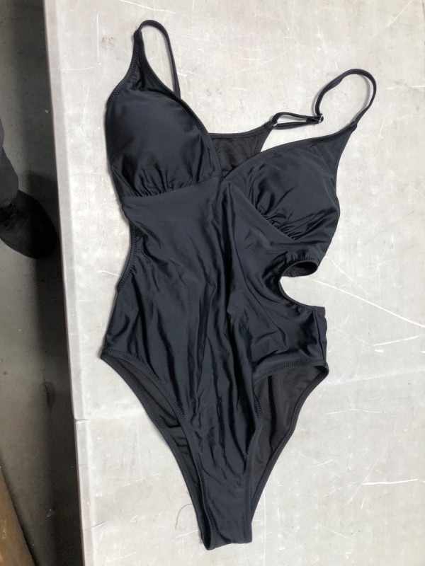 Photo 2 of 2 item bundle 
Kasey Black Cutout Back One Piece Swimsuit
black bottoms 
size large 