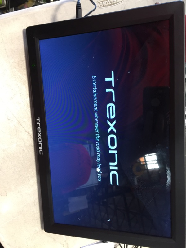 Photo 2 of Trexonic Portable Rechargeable 14 Inch LED TV with HDMI, SD/MMC, USB, VGA, AV in/Out and Built-in Digital Tuner
