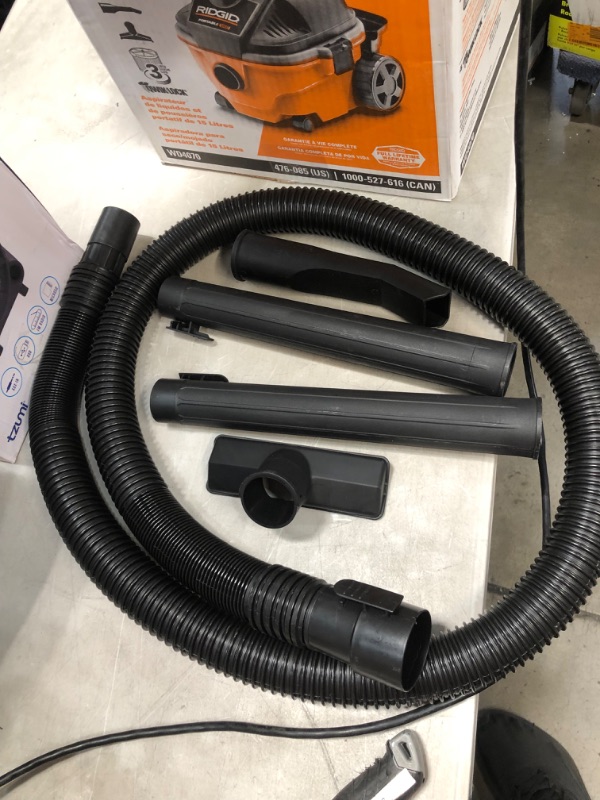 Photo 3 of PARTS ONLY DOES NOT POWER ON 
RIDGID 4 Gallon 5.0-Peak HP Portable Wet/Dry Shop Vacuum with Fine Dust Filter, Hose and Accessories