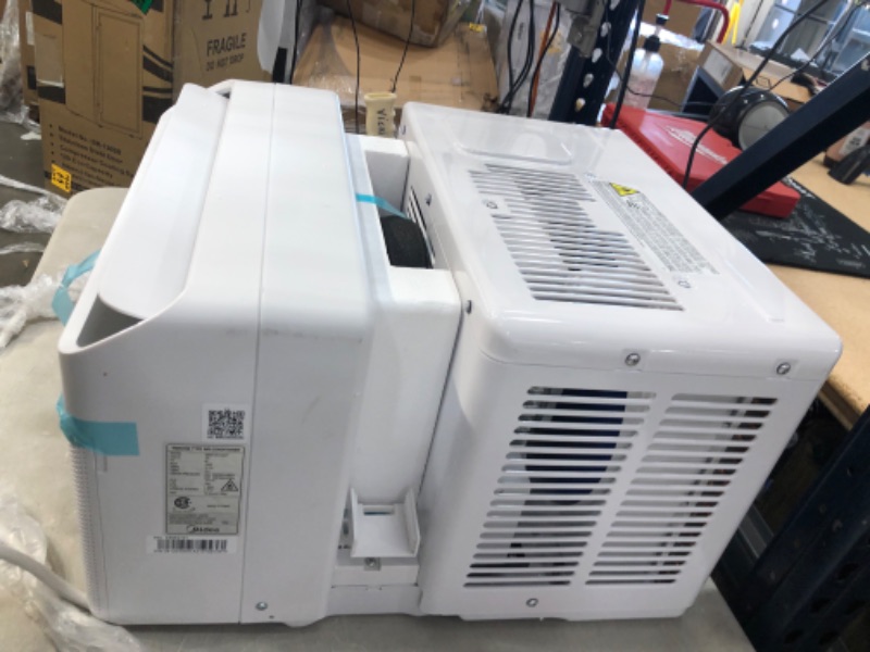 Photo 1 of Midea 12,000 BTU U-Shaped Smart Inverter Window Air Conditioner–Cools up to 550 Sq. Ft., Ultra Quiet with Open Window Flexibility, Works with Alexa/Google Assistant, 35% Energy Savings, Remote Control
