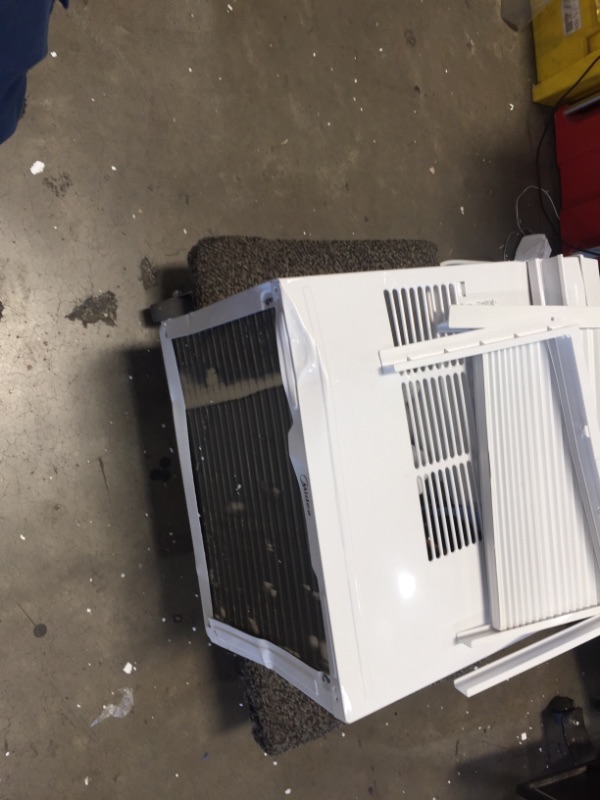 Photo 6 of *Severe Damage*
Midea 12,000 BTU EasyCool Window Air Conditioner, Dehumidifier and Fan - Cool, Circulate and Dehumidify up to 550 Sq. Ft., Reusable Filter, Remote Control
