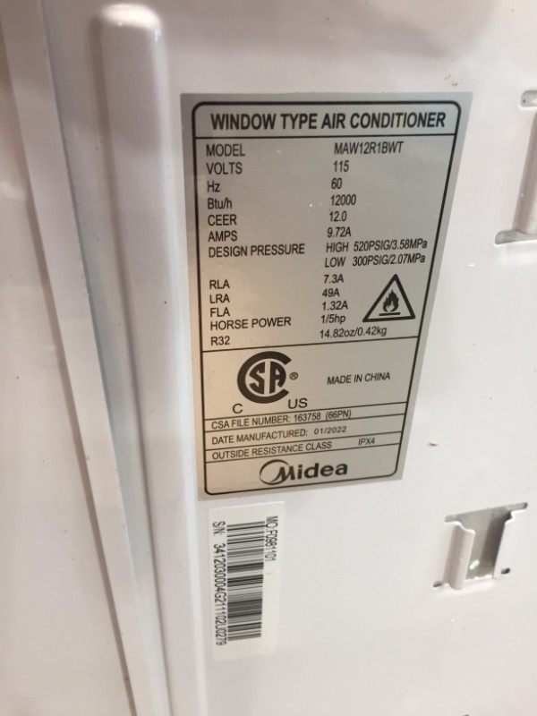 Photo 4 of *Severe Damage*
Midea 12,000 BTU EasyCool Window Air Conditioner, Dehumidifier and Fan - Cool, Circulate and Dehumidify up to 550 Sq. Ft., Reusable Filter, Remote Control
