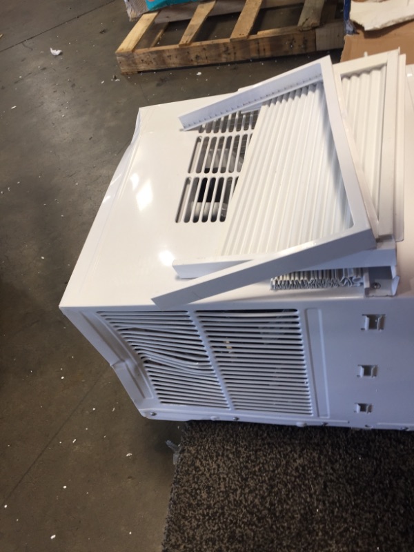 Photo 5 of *Severe Damage*
Midea 12,000 BTU EasyCool Window Air Conditioner, Dehumidifier and Fan - Cool, Circulate and Dehumidify up to 550 Sq. Ft., Reusable Filter, Remote Control
