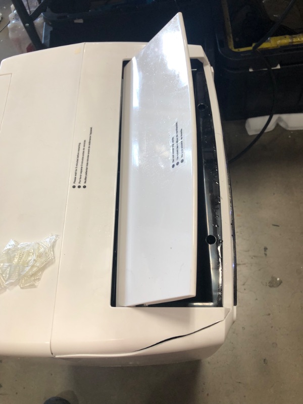 Photo 7 of PARTS ONLY COMPRESSOR NOT COMING ON 
Honeywell (White) Classic Portable Air Conditioner with Dehumidifier & Fan, Cools Rooms Up to 700 Sq. Ft. with Drain Pan & Insulation Tape, MN4CFSWW9, 29.400