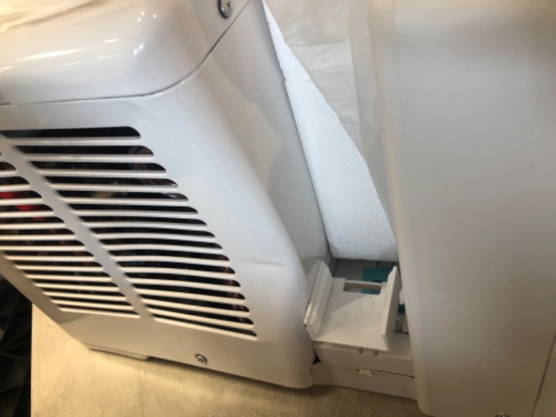 Photo 3 of Midea 12,000 BTU U-Shaped Smart Inverter Window Air Conditioner–Cools up to 550 Sq. Ft., Ultra Quiet with Open Window Flexibility, Works with Alexa/Google Assistant, 35% Energy Savings, Remote Control
Product Dimensions	19.17 x 21.97 x 13.46 inches