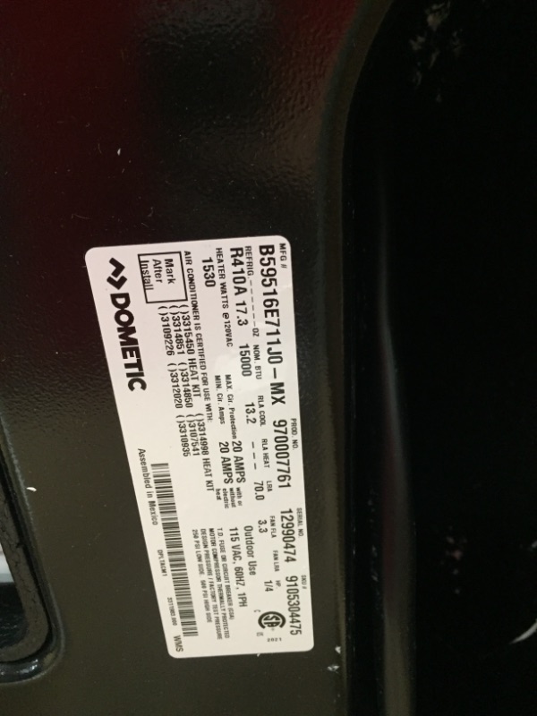 Photo 1 of **DAMAGED** Dometic Brisk II Rooftop Air Conditioner, 15,000 BTU - Black (B59516.XX1J0)
