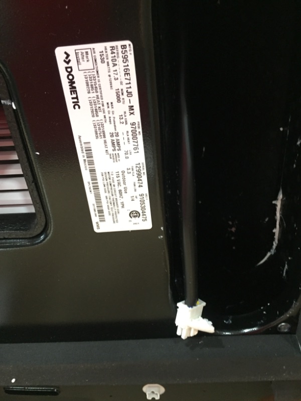 Photo 2 of **DAMAGED** Dometic Brisk II Rooftop Air Conditioner, 15,000 BTU - Black (B59516.XX1J0)
