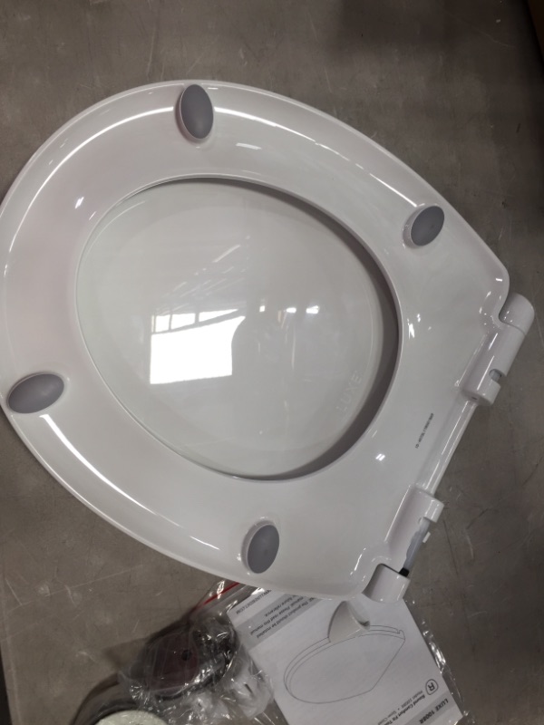 Photo 3 of **SMALL CHIP** LUXE Elongated Comfort Fit Toilet Seat
