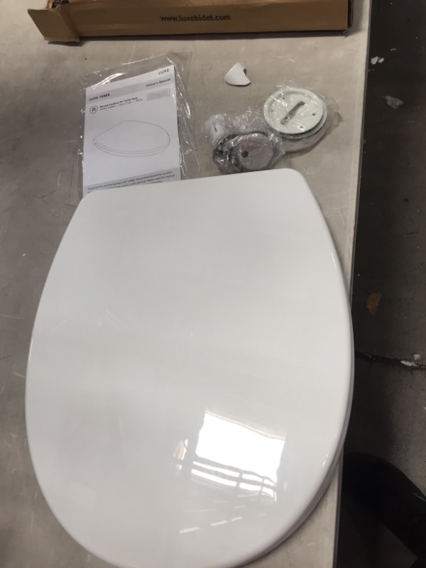 Photo 4 of **SMALL CHIP** LUXE Elongated Comfort Fit Toilet Seat
