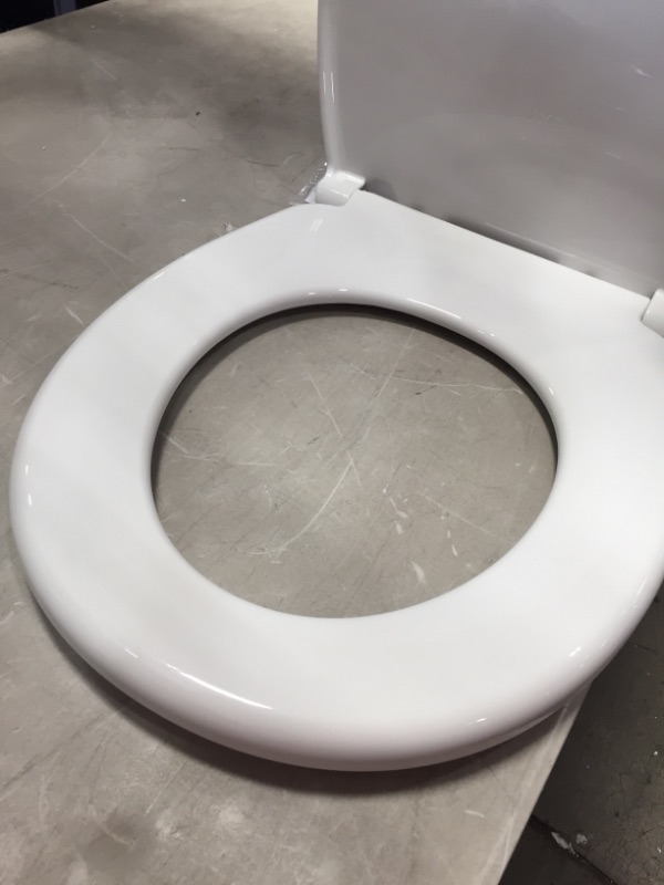 Photo 1 of **SMALL CHIP** LUXE Elongated Comfort Fit Toilet Seat
