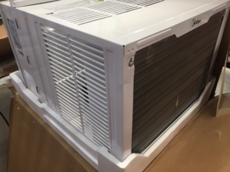 Photo 5 of **MINOR BENDS** Midea 12,000 BTU EasyCool Window Air Conditioner, Dehumidifier and Fan - Cool, Circulate and Dehumidify up to 550 Sq. Ft., Reusable Filter, Remote Control
