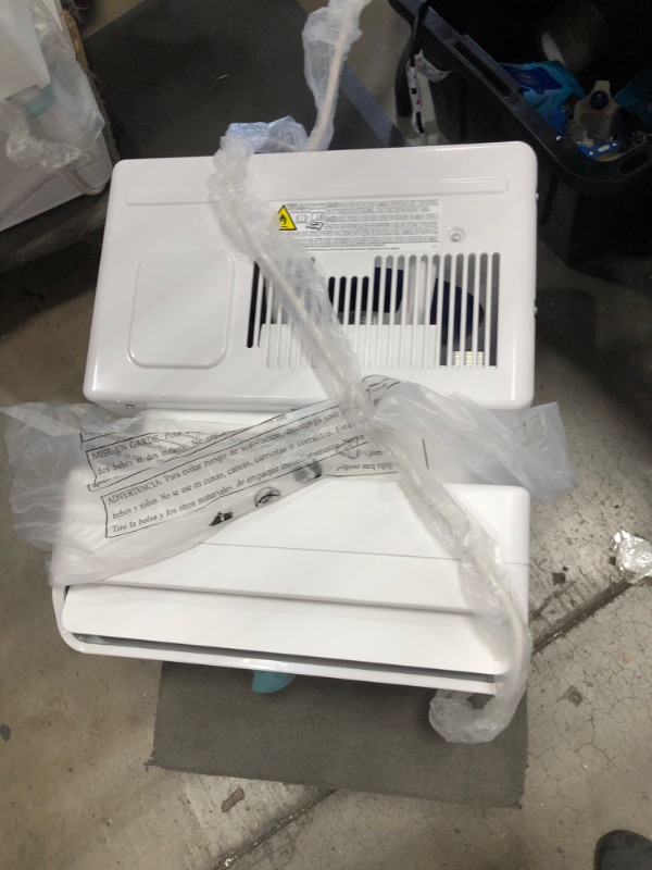 Photo 1 of Midea 8,000 BTU U-Shaped Smart Inverter Window Air Conditioner–Cools up to 350 Sq. Ft., Ultra Quiet with Open Window Flexibility, Works with Alexa/Google Assistant, 35% Energy Savings, Remote Control