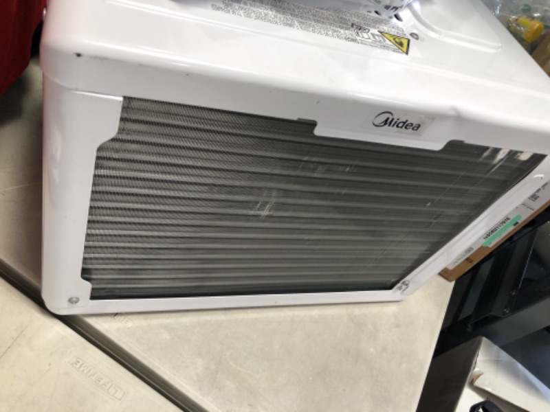 Photo 5 of ***PARTS ONLY COMPRESSOR DOES NOT COME ON****

Midea 8,000 BTU U-Shaped Smart Inverter Window Air Conditioner–Cools up to 350 Sq. Ft., Ultra Quiet with Open Window Flexibility, Works with Alexa/Google Assistant, 35% Energy Savings, Remote Control