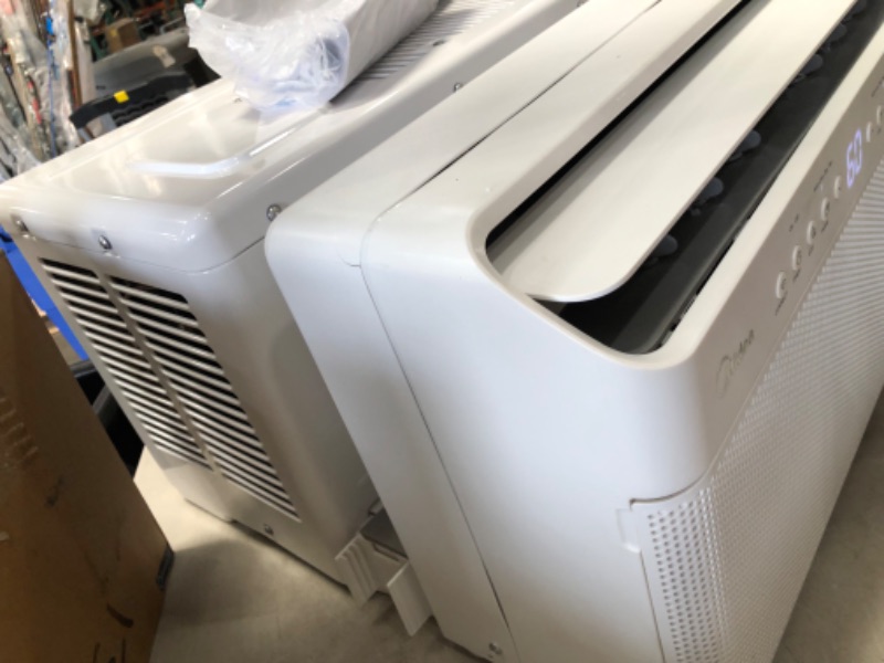 Photo 4 of ***PARTS ONLY COMPRESSOR DOES NOT COME ON****

Midea 8,000 BTU U-Shaped Smart Inverter Window Air Conditioner–Cools up to 350 Sq. Ft., Ultra Quiet with Open Window Flexibility, Works with Alexa/Google Assistant, 35% Energy Savings, Remote Control