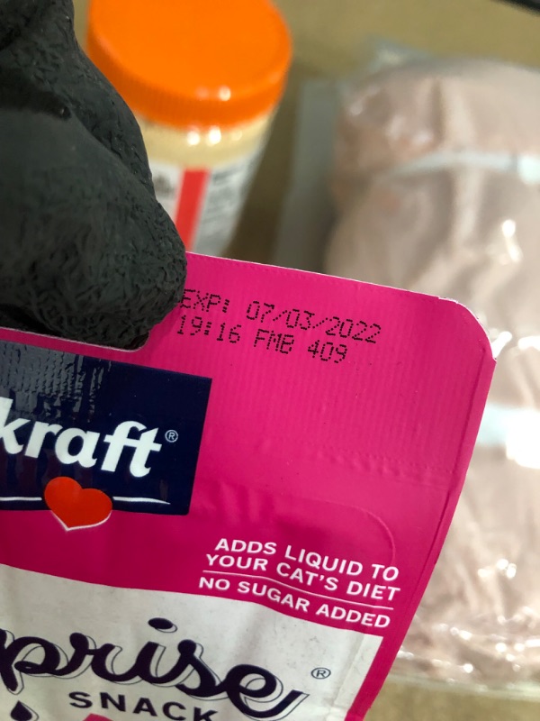 Photo 1 of *EXPIRES July 2022*
Miscellaneous Bundle (powdered peanut butter, cat food topper, organic cereal, and 60x80 sherpa fleece throw blanket) 
