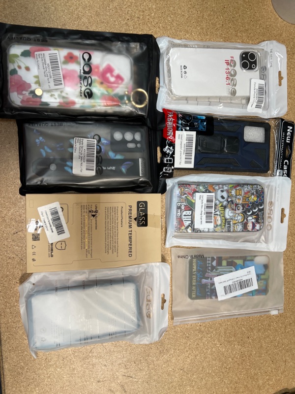 Photo 1 of bundle of phone cases and screen protector 8 piece bundle