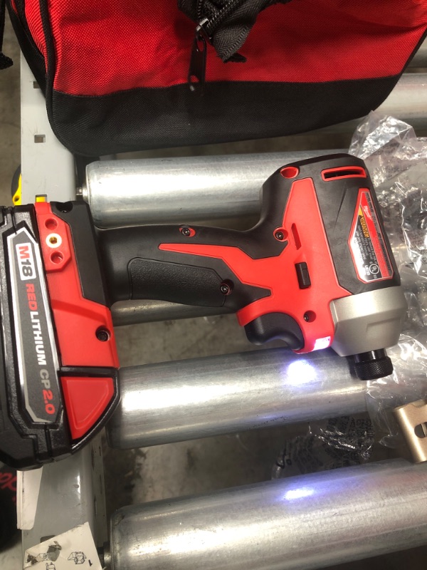 Photo 6 of 
Milwaukee
M18 18V Lithium-Ion Brushless Cordless Compact Drill/Impact Combo Kit (2-Tool) W/ (2) 2.0Ah Batteries, Charger & Bag