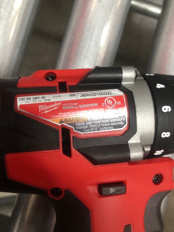 Photo 2 of 
Milwaukee
M18 18V Lithium-Ion Brushless Cordless Compact Drill/Impact Combo Kit (2-Tool) W/ (2) 2.0Ah Batteries, Charger & Bag