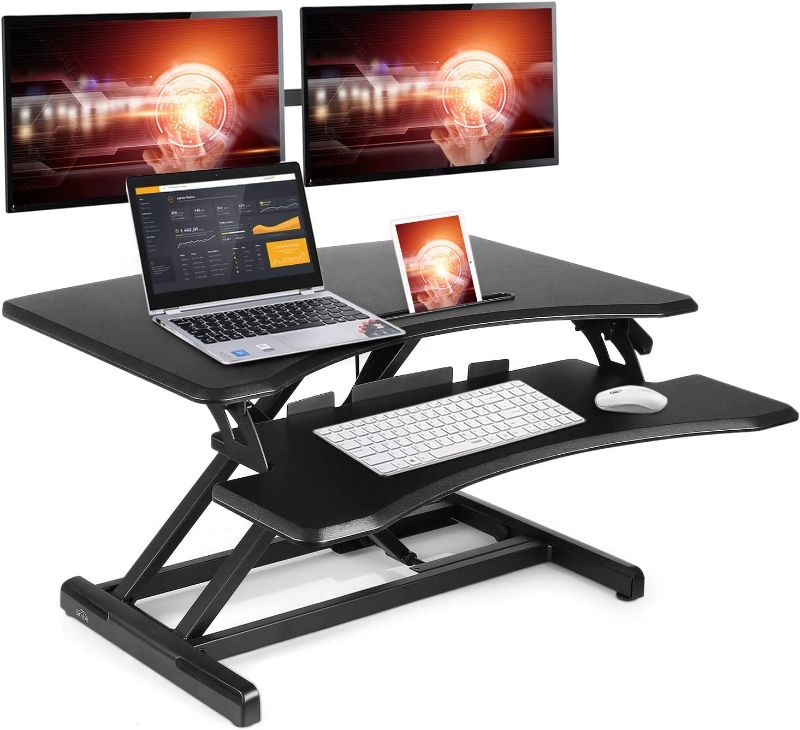 Photo 1 of Standing Desk Converter 30 inch, Height Adjustable Sit Stand Desk Riser, Stand Up Desk for Home Office, Sit to Stand Tabletop with Keyboard Tray for Dual Monitors