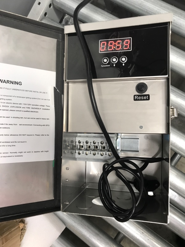 Photo 2 of · High-Performance Multi-Tap Output: Stainless steel transformer converts 120V AC household voltage to 12V / 13V / 14V / 15V security voltage.