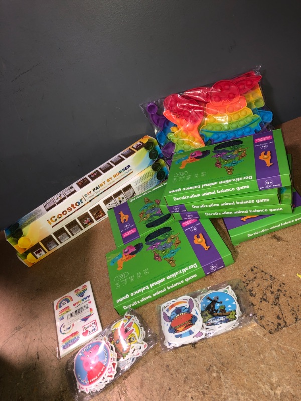 Photo 1 of *BUNDLE OF KIDS POP ITS, GAMES, STICKERS, PAINT KIT*