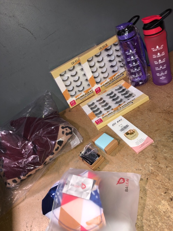 Photo 1 of *BUNDLE OF MIXED ITEMS-WATER BOTTLES, EYE LASH KITS, NAILS, ANXIETY NECKLES,WOMENS DERSHORTS,WOMEN WINTER DRESS/SHIRT*