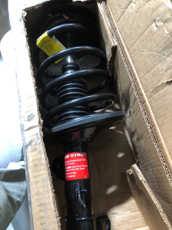 Photo 1 of Monroe 171438 Quick Complete Strut Assembly
