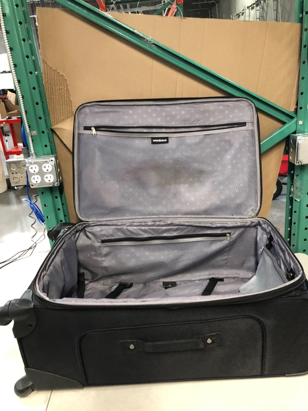 Photo 4 of *Used* SwissGear Sion Softside Expandable Roller Luggage, Black, Checked-Large 29-Inch (18 x 10.5 x 29)