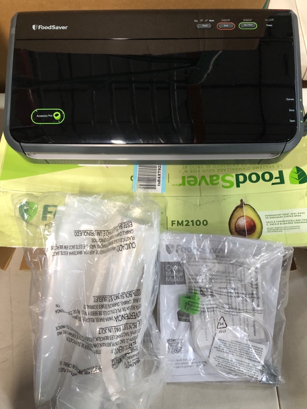 Photo 2 of *NEW* NOT TESTED* FoodSaver Vacuum Sealer Machine with Automatic Bag Detection, Sealer Bags and Roll, and Handheld Vacuum Sealer for Airtight Food Storage and Sous Vide, Silver Black